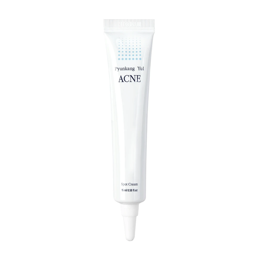 En tub Pyunkang Yul Acne Spot Cream 15ml på vit bakgrund, innehållande akne kräm och kopparpeptider för att minska inflammation.