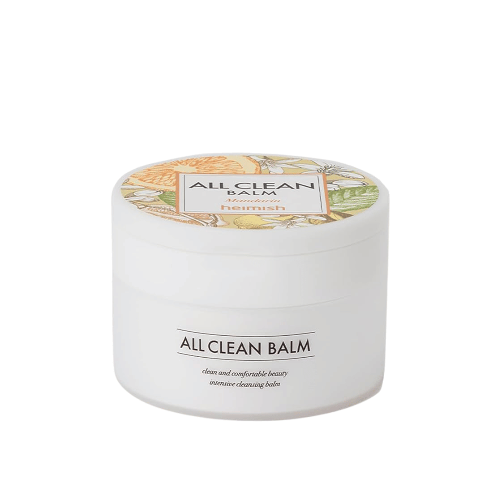Um frasco de Heimish All Clean Balm com aroma de tangerina, um bálsamo de limpeza intensivo, com um rótulo colorido e embalagem branca.