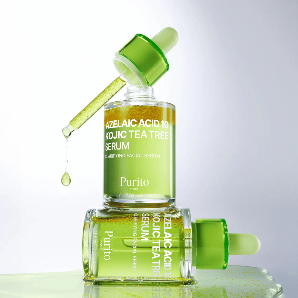 Purito Azelaic Acid 10 Kojic Tea Tree Serum – fórmula verde fresca com gota do conta-gotas que mostra a textura leve do sérum.