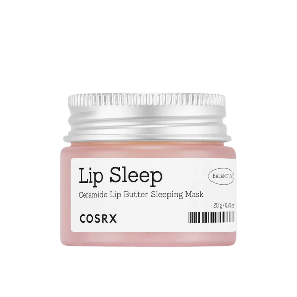 COSRX Lip Sleep Ceramide Lip Butter Sleeping Mask em pote rosa com tampa prateada. Uma máscara noturna sem fragrância e nutritiva para lábios macios e hidratados.