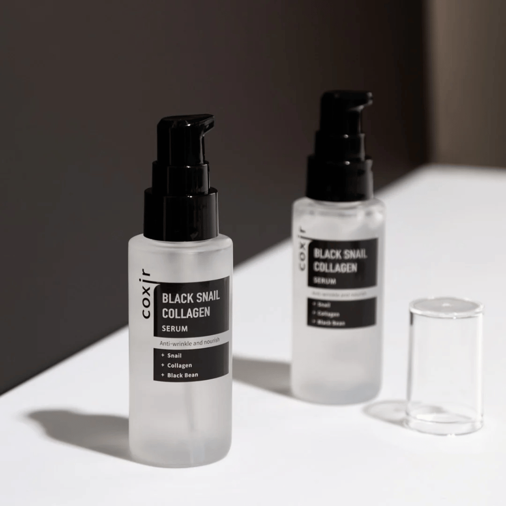  A imagem mostra duas garrafas de "Black Snail Collagen Serum". O sérum é comercializado como anti-rugas e nutritivo, com ingredientes como extrato de caracol, colágeno e feijão preto.