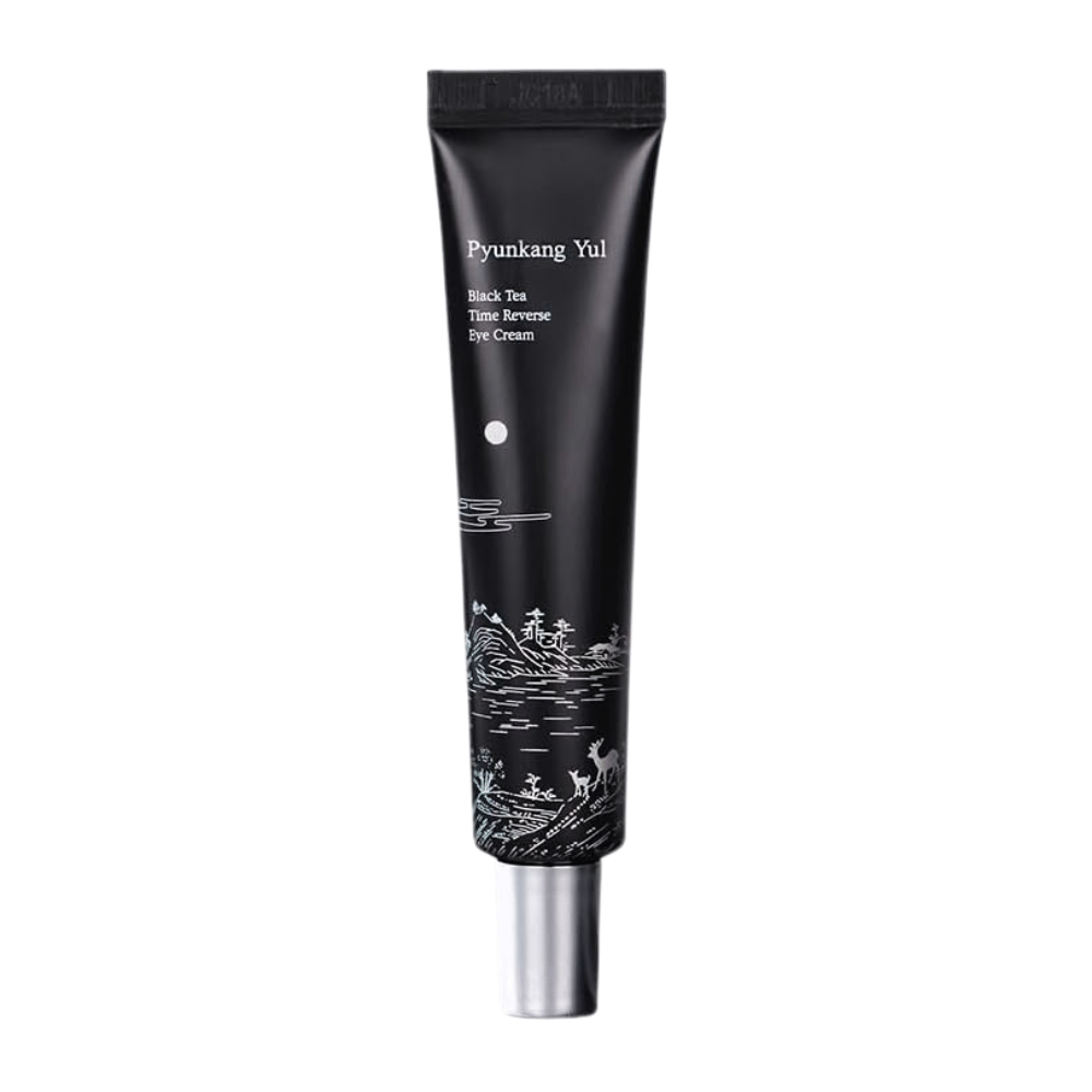 Pyunkang Yul Black Tea Time Reverse Eye Cream 25 ml em tubo preto com chá preto fermentado, peptídeos e ingredientes hidratantes para a zona dos olhos.