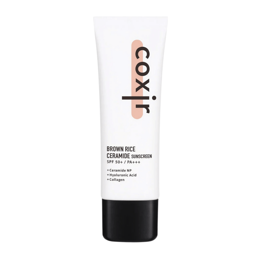 Produktbild av Coxir Brown Rice Ceramide Sunscreen i vit tub med svart kork, SPF 50+ PA+++, innehåller ceramider, hyaluronsyra och kollagen.