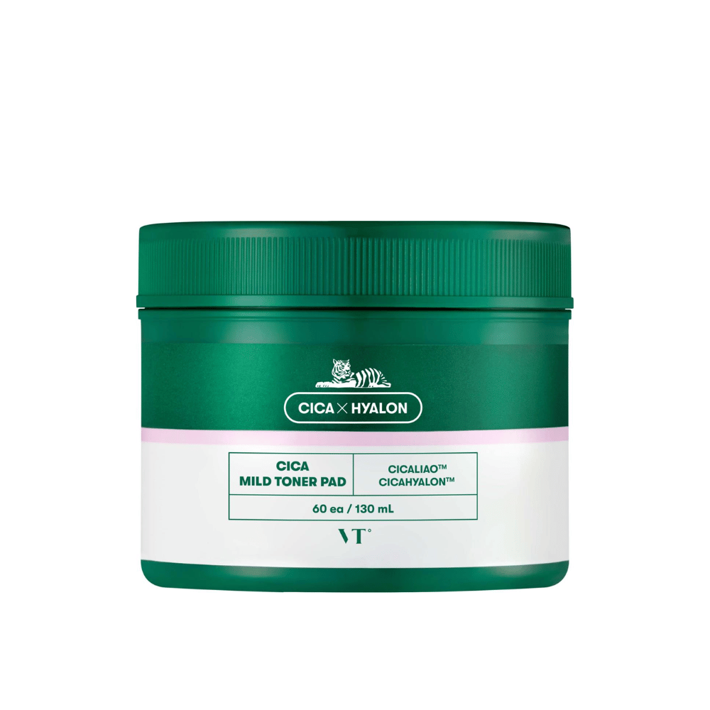 Frasco verde com VT Cica Mild Toner Pad, 60 almofadas/130 ml, com rótulo branco e rosa e logotipo de tigre sobre fundo branco.