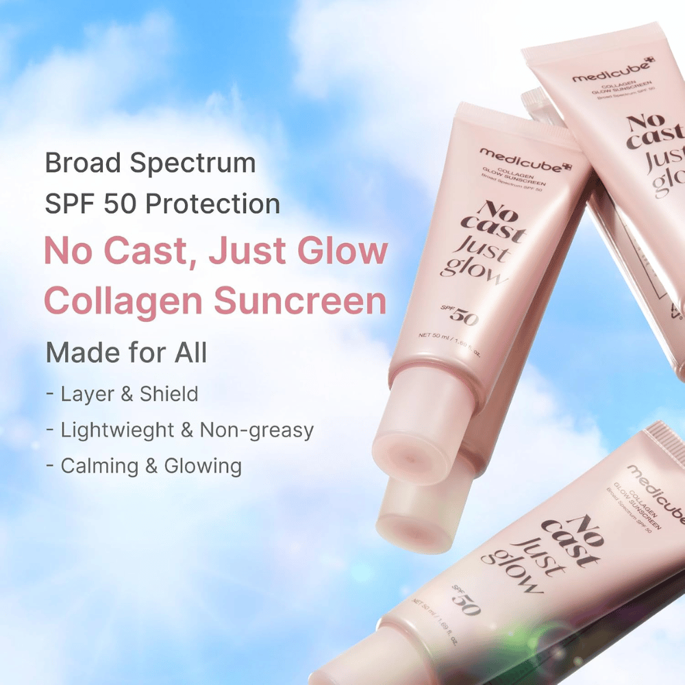 Medicube Protetor Solar Collagen Glow SPF 50, protetor solar leve com efeito glow sem película branca. Tubos rosa de protetor solar contra um céu azul.