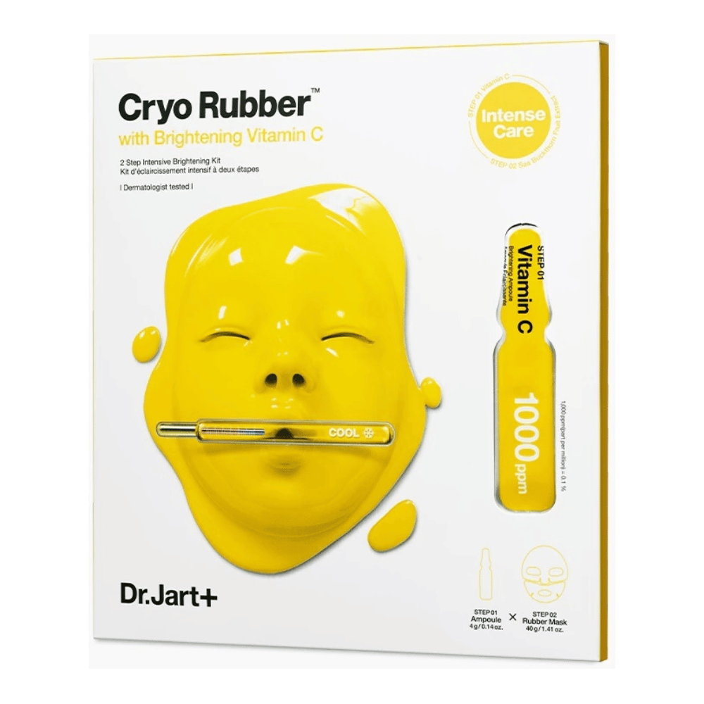 Dr.Jart+ produto de beleza chamado 'Cryo Rubber™ com Vitamina C Iluminadora'. A embalagem mostra uma máscara facial amarela pingando com líquido. Menciona-se que é um 'KIT intensivo iluminador de 2 passos' e que é 'testado dermatologicamente'. Ilustração de 'Vitamina C 1000ppm' encontra-se à direita.