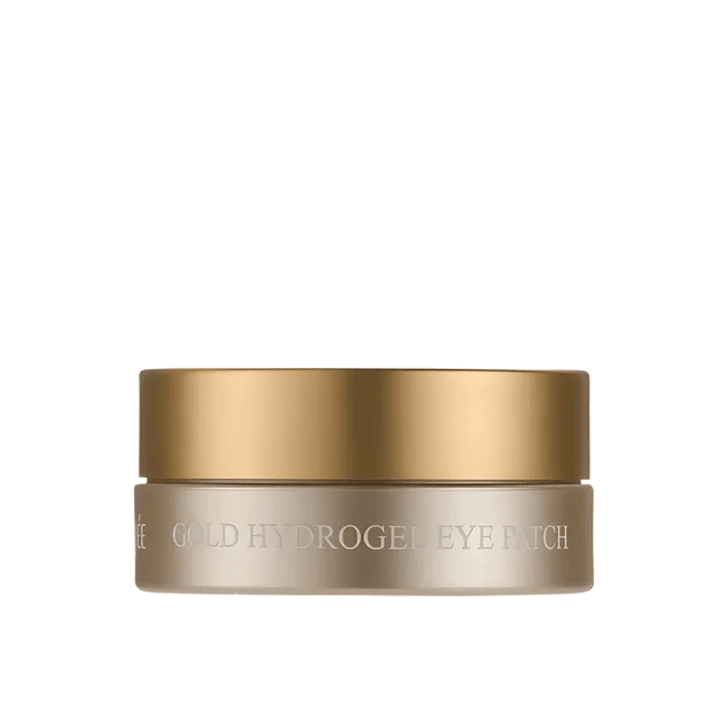Imagem de produto recortada de PETITFEE Gold Hydrogel Eye Patch em elegante boião dourado sobre fundo claro. O design transmite uma impressão exclusiva e luxuosa.