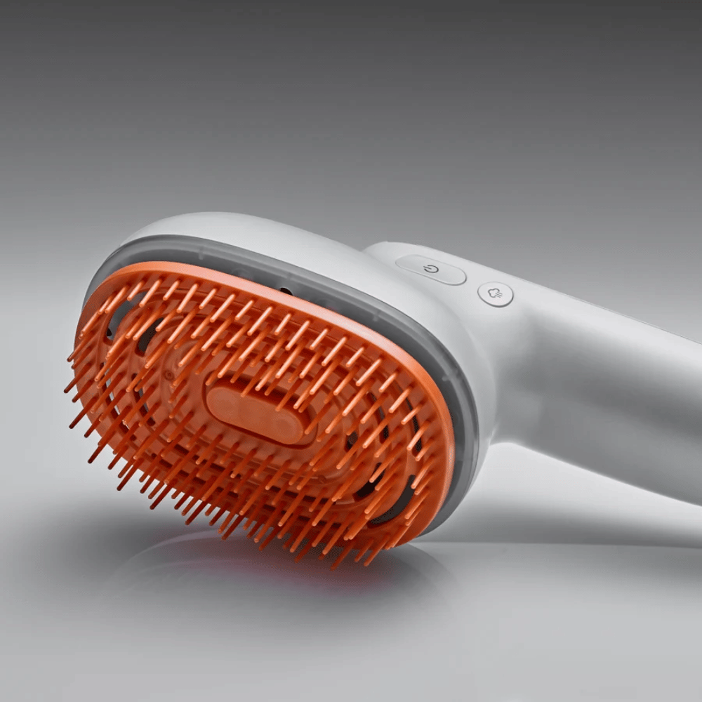 LILYEVE GrowTurn Brush Steam Booster – grande plano da cabeça da escova e dos botões de controlo