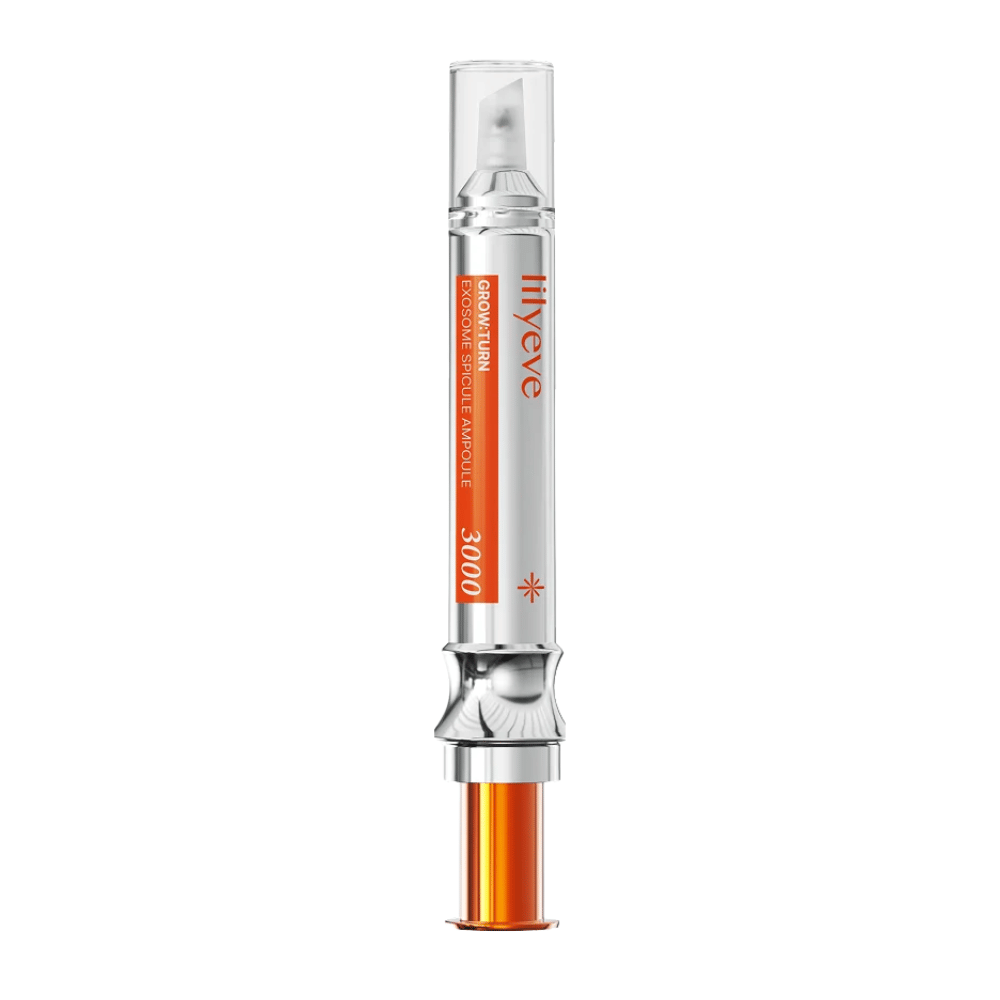 LILYEVE Grow Turn Exosome Spicule Ampoule 3000 – ampola para o couro cabeludo com aplicador de precisão em embalagem prateada e laranja.