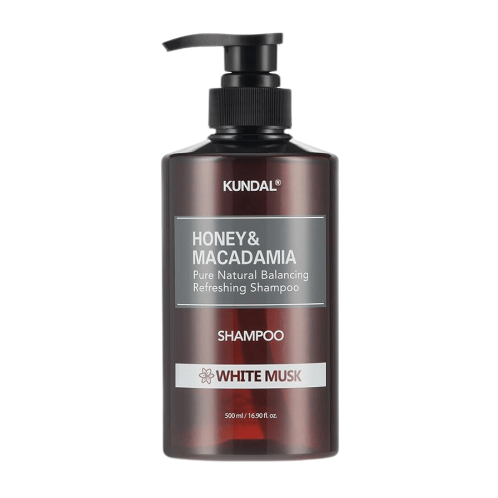 KUNDAL Honey & Macadamia Nature Shampoo White Musk em garrafa de plástico castanha com bomba, 500 ml.