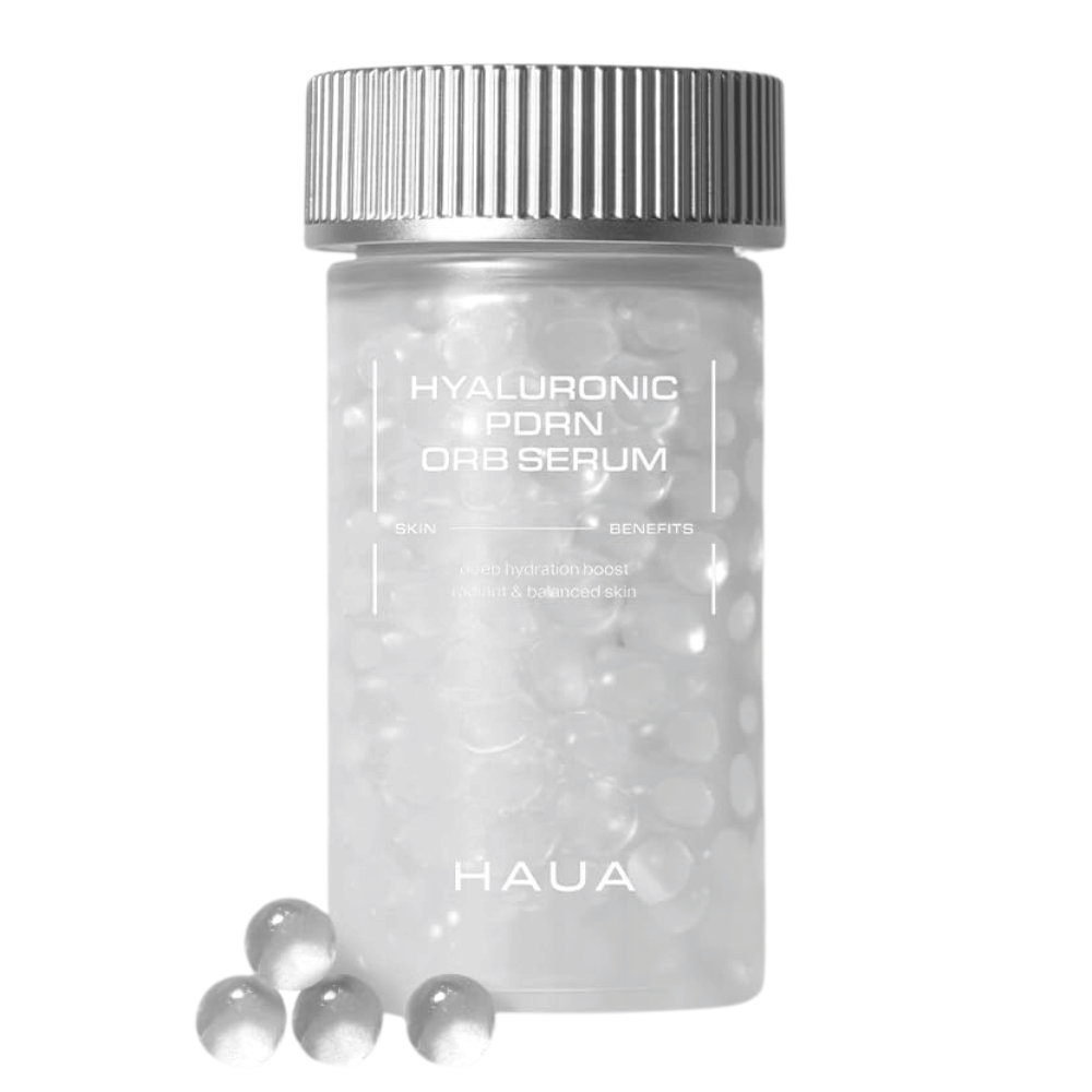 Imagem do produto de HAUA Hyaluronic PDRN Orb Serum sobre fundo branco. O recipiente transparente está preenchido com cápsulas de sérum e destaca a formulação encapsulada única do produto.