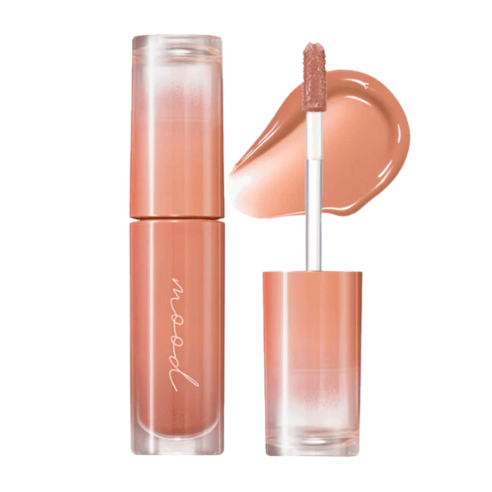Ink Mood Glowy Tint é um brilho labial com uma fórmula leve e brilhante que oferece uma cor e brilho natural para os lábios. Perfeito para criar um visual fresco e radiante. Disponível em várias tonalidades.