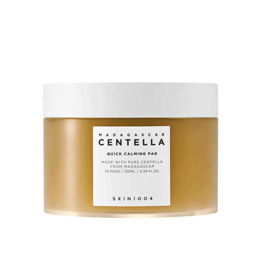 SKIN1004 Madagascar Centella Quick Calming Pad – pote de plástico castanho com tampa branca e etiqueta branca, contém 70 discos (130 ml).