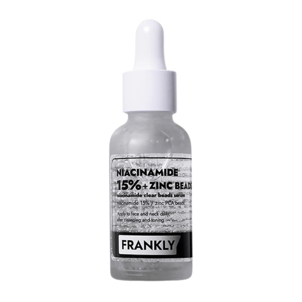 Imagem do produto do FRANKLY Niacinamide 15% + Zinc Beads Serum em frasco de vidro com conta-gotas. Um sérum que equilibra, acalma e melhora a clareza da pele.