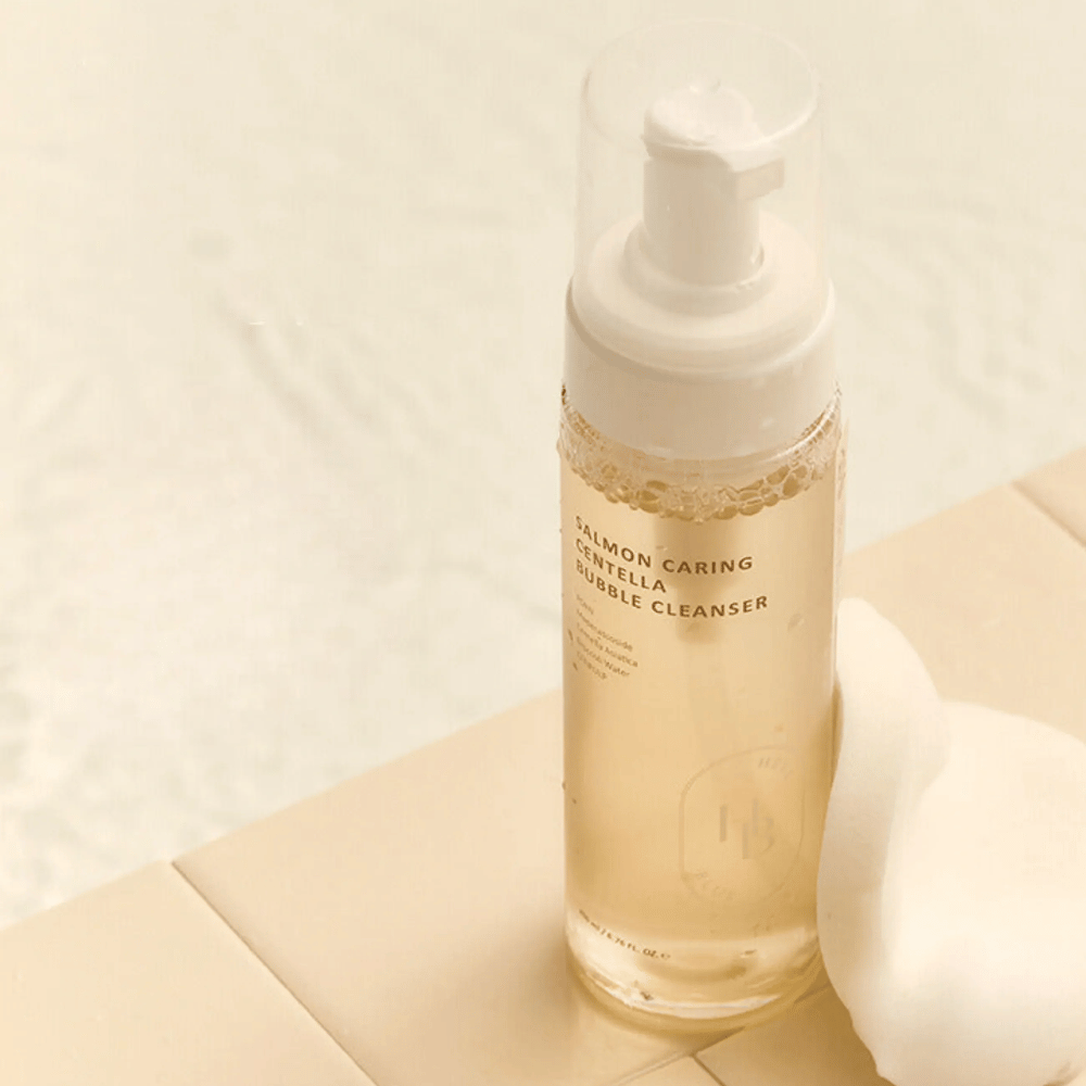 Heveblue Salmon Caring Centella Bubble Cleanser – limpeza facial coreano com Centella Asiatica e PDRN de salmão que ajuda a limpar a pele suavemente e proporciona uma espuma de limpeza suave.