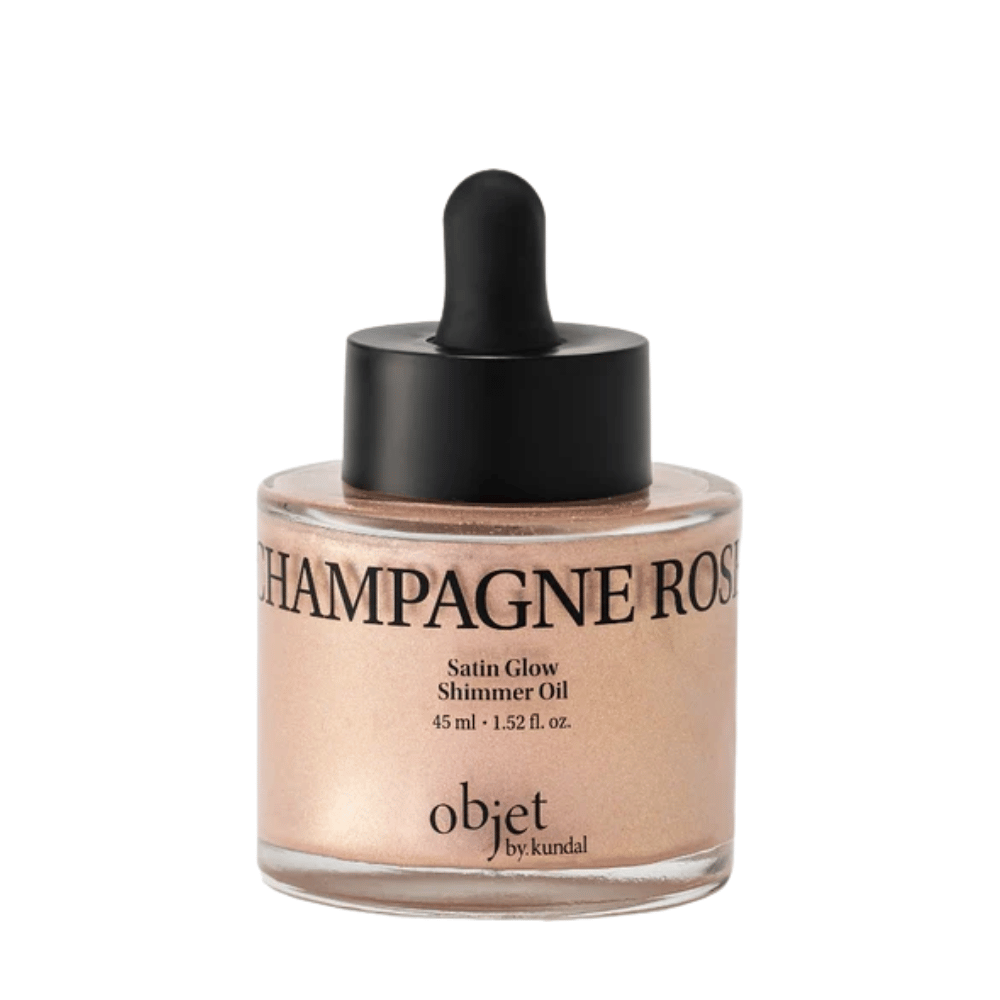 Objet by KUNDAL Satin Glow Shimmer Oil Champagne Rose 45 ml – óleo corporal iluminador com acabamento finamente cintilante em ouro rosa.