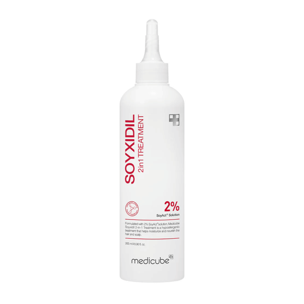 Imagem do produto de Medicube Soyxidil 2in1 Treatment em garrafa branca com texto vermelho. Contém 2% de Solução SoyAct™ para fortalecer o cabelo e o couro cabeludo.