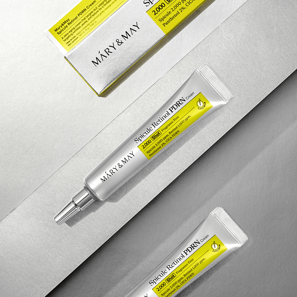 MARY & MAY Spicule Retinol PDRN Cream em tubo e embalagem sobre fundo claro, um creme facial ativo com retinol, tecnologia de espículas e PDRN para melhoria da estrutura e renovação da pele.