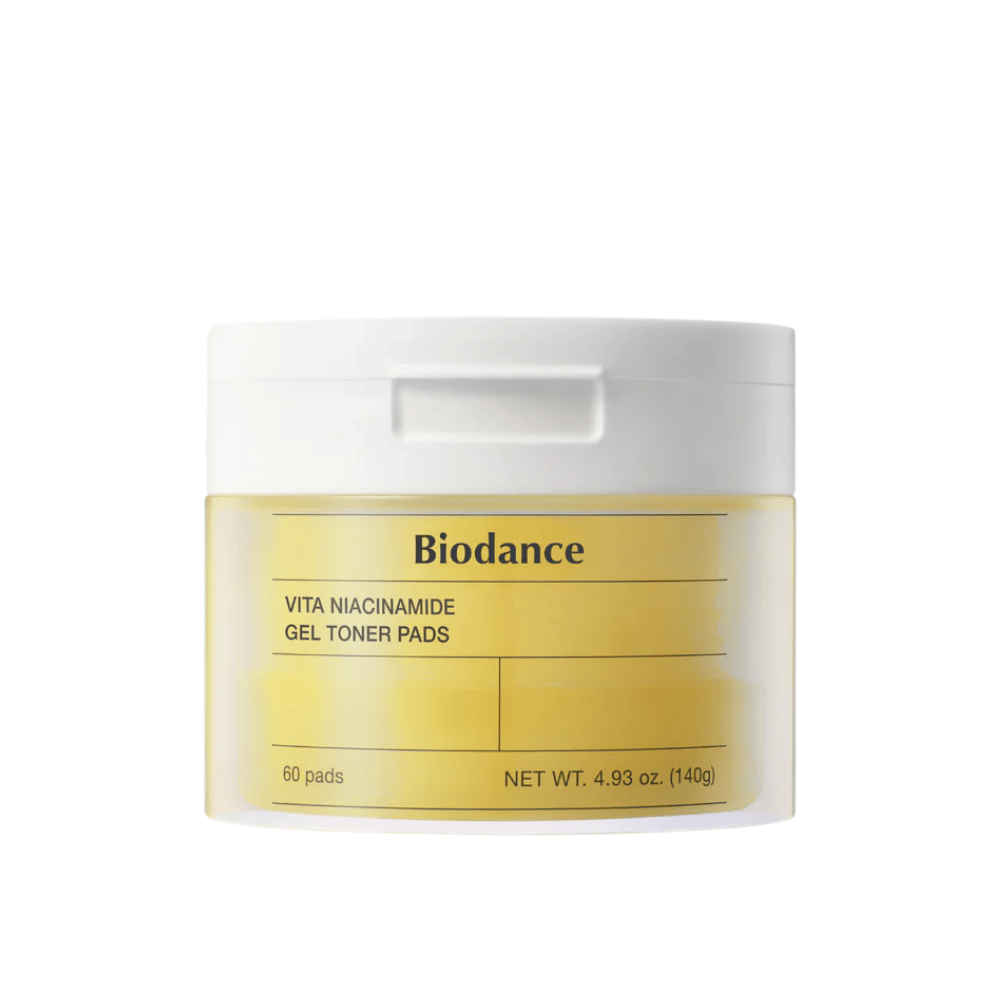 Biodance Vita Niacinamide Gel Toner Pads – embalagem com 60 discos em um pote amarelo com tampa branca, projetada para uniformizar o tom da pele e brilho.